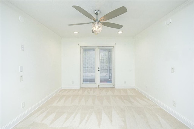 empty room with light carpet and ceiling fan