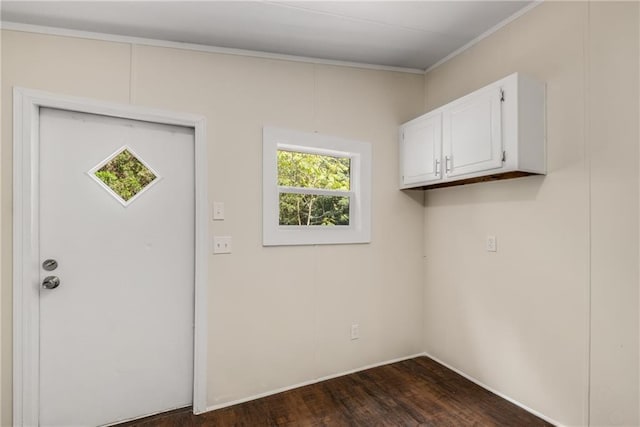 laundry room with dark wood-type flooring