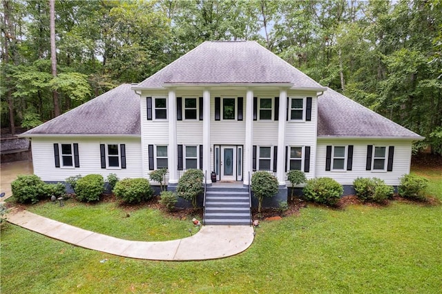 view of front of home with a front lawn