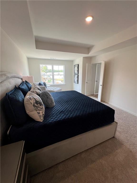 1569 Aiden Way Unit 35, Conyers, GA 30013 - carpeted bedroom featuring baseboards