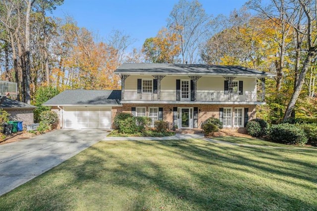 view of front of home with driveway, a front lawn, a porch, a garage, and a balcony