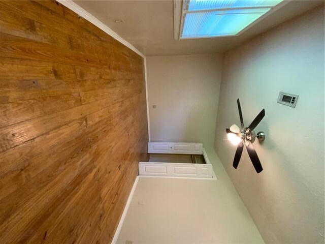 995 Gadsden Rd, Cave Spring, GA 30124 - empty room featuring wooden walls and a ceiling fan