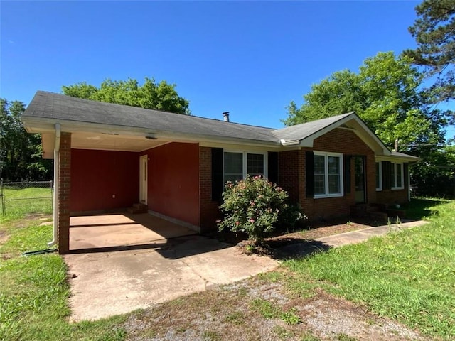 995 Gadsden Rd, Cave Spring, GA 30124 - view of front of property with brick siding and a carport