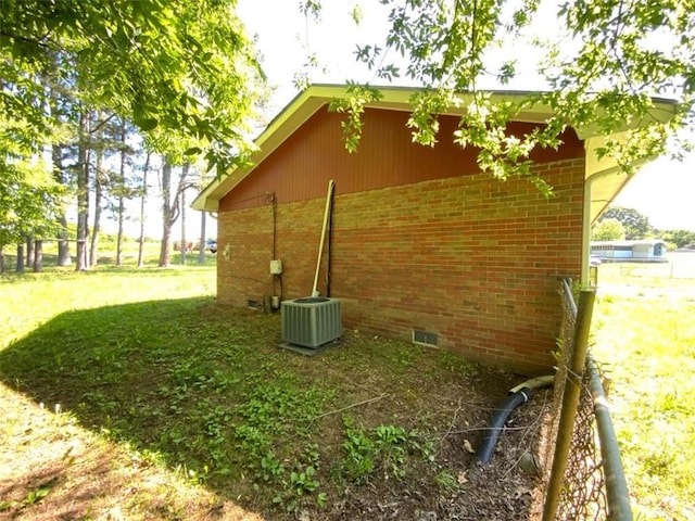 995 Gadsden Rd, Cave Spring, GA 30124 - view of home's exterior with crawl space, cooling unit, brick siding, and a yard