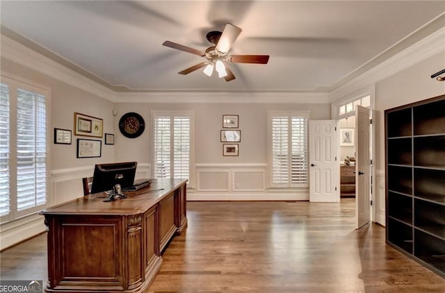 office with crown molding, a ceiling fan, and a healthy amount of sunlight