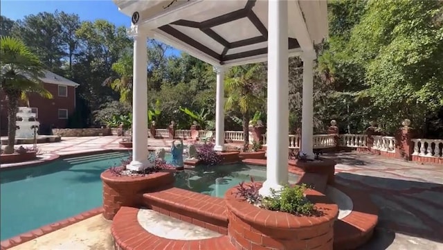 view of patio featuring an outdoor pool