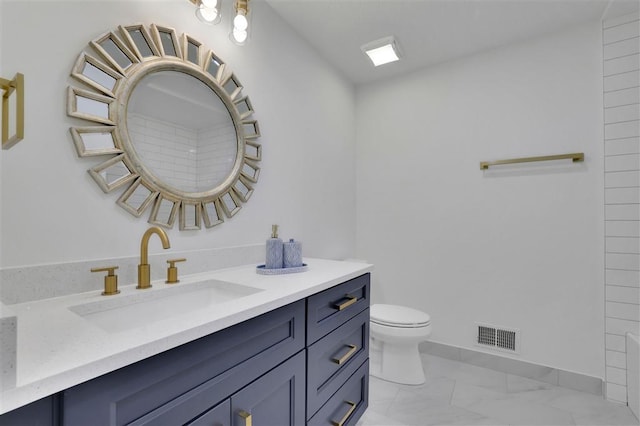 full bath featuring visible vents, toilet, marble finish floor, and vanity