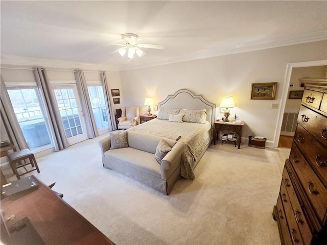 bedroom featuring baseboards, ceiling fan, light carpet, crown molding, and access to outside