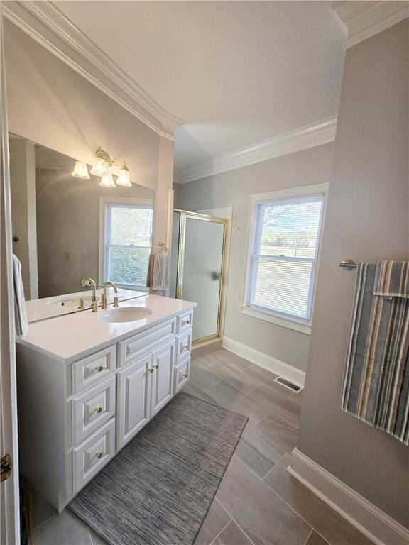 bathroom featuring visible vents, baseboards, ornamental molding, a stall shower, and vanity