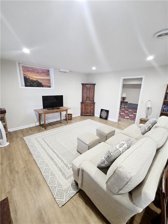 living room with light wood-type flooring