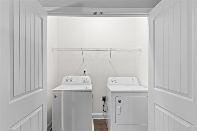 laundry room featuring washing machine and clothes dryer and laundry area