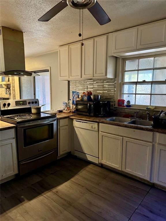 kitchen featuring dishwasher, white cabinetry, sink, island range hood, and stainless steel electric range