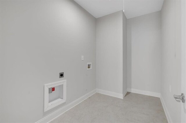 laundry area featuring hookup for a washing machine and hookup for an electric dryer