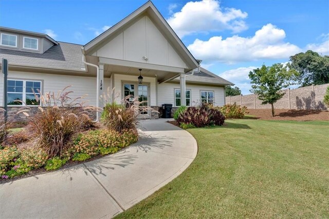 exterior space featuring a lawn