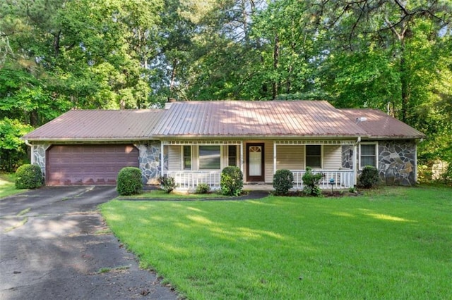 1757 Mystery Cir SW, Conyers, GA 30094 - ranch-style house with a garage, covered porch, asphalt driveway, stone siding, and a front lawn