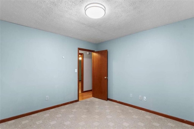 1757 Mystery Cir SW, Conyers, GA 30094 - carpeted empty room with a textured ceiling and baseboards