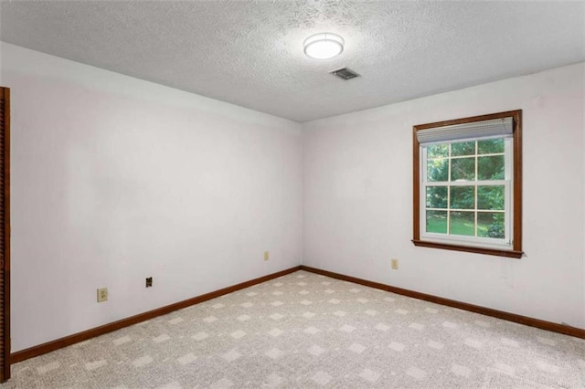 1757 Mystery Cir SW, Conyers, GA 30094 - unfurnished room with a textured ceiling, carpet flooring, and baseboards