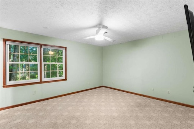 1757 Mystery Cir SW, Conyers, GA 30094 - unfurnished room with carpet, a ceiling fan, baseboards, and a textured ceiling