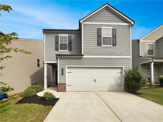 traditional-style home featuring a garage, concrete driveway, and brick siding