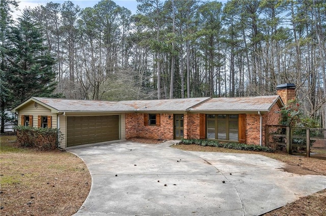 ranch-style home with a garage