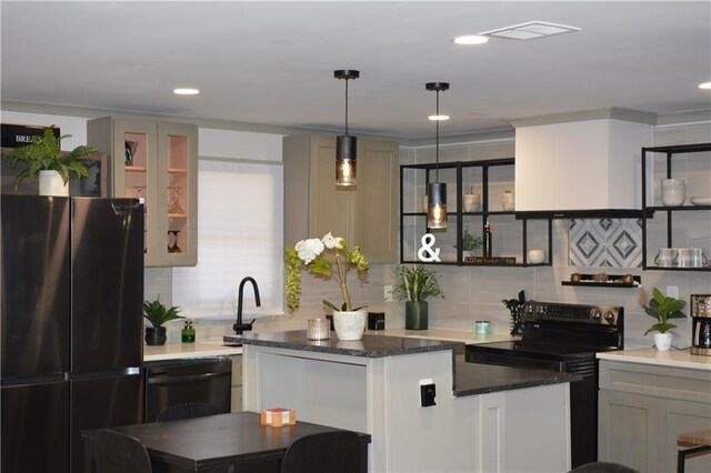 kitchen with decorative backsplash, visible vents, glass insert cabinets, decorative light fixtures, and black appliances