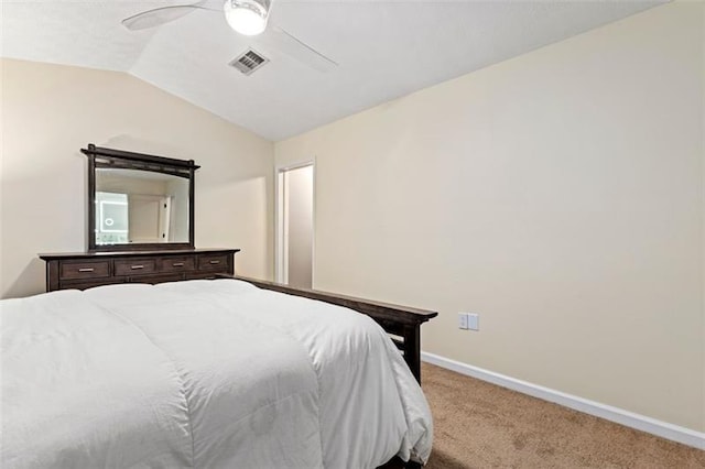 bedroom featuring vaulted ceiling, ceiling fan, and carpet