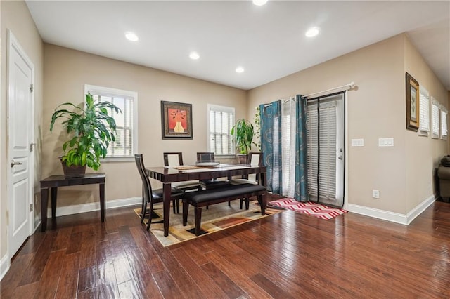 dining area featuring hardwood / wood-style flooring, recessed lighting, and baseboards