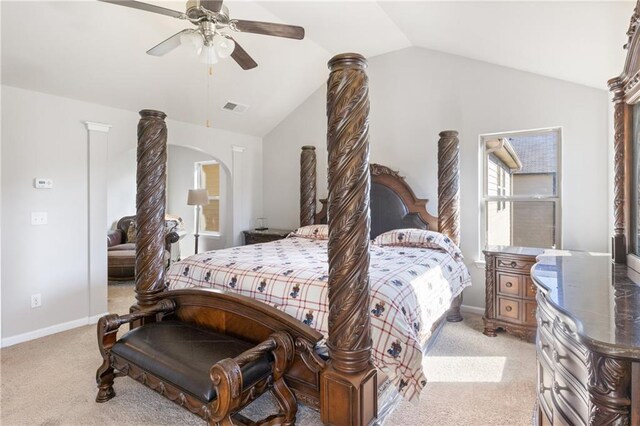 carpeted bedroom featuring vaulted ceiling and ceiling fan