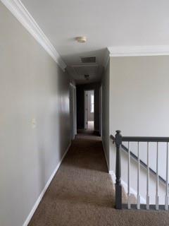 1200 Larson Ln SW, Marietta, GA 30064 - corridor featuring crown molding, baseboards, and carpet flooring