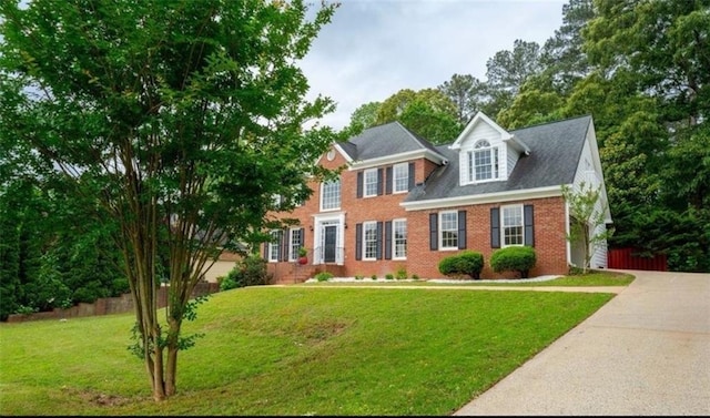 1200 Larson Ln SW, Marietta, GA 30064 - view of front of home featuring brick siding, concrete driveway, and a garage