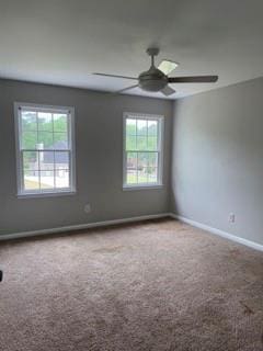 1200 Larson Ln SW, Marietta, GA 30064 - empty room with carpet floors, baseboards, and a ceiling fan
