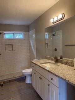 1200 Larson Ln SW, Marietta, GA 30064 - full bathroom with tiled shower, toilet, and vanity