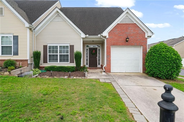 40 Brickton Way E, Dawsonville, GA 30534 - view of front of house featuring brick siding, concrete driveway, a front yard, and an attached garage