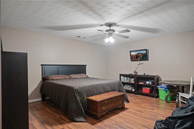 40 Brickton Way E, Dawsonville, GA 30534 - bedroom with wood finished floors and ceiling fan