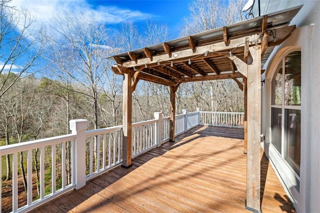 wooden deck with a pergola