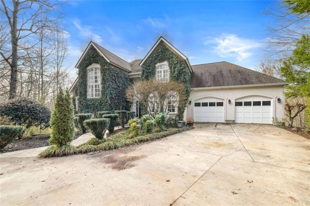 front facade with a garage