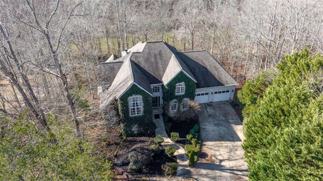 exterior space with a wooded view