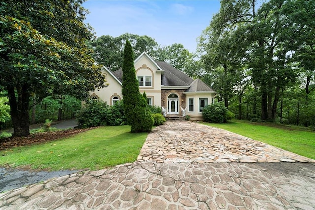 790 Friendship Church Rd, Douglasville, GA 30134 - traditional home featuring a front yard, stucco siding, and driveway