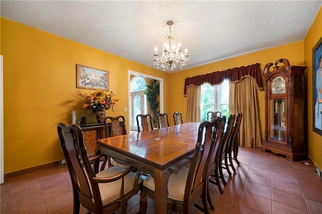 790 Friendship Church Rd, Douglasville, GA 30134 - tiled dining area with a chandelier and a textured ceiling