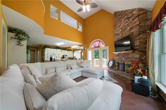 790 Friendship Church Rd, Douglasville, GA 30134 - living area featuring ceiling fan, tile patterned flooring, high vaulted ceiling, and a fireplace