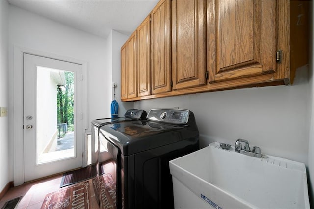 790 Friendship Church Rd, Douglasville, GA 30134 - washroom featuring cabinet space and washing machine and dryer