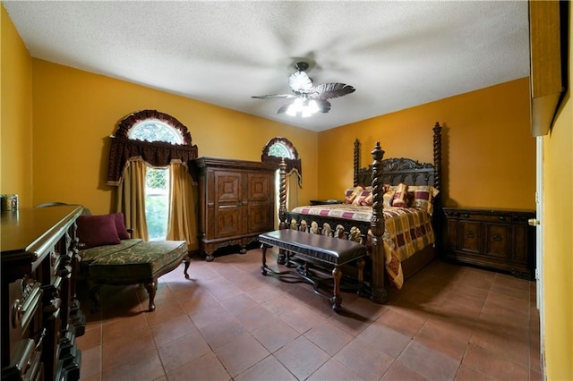 790 Friendship Church Rd, Douglasville, GA 30134 - tiled bedroom featuring ceiling fan and a textured ceiling