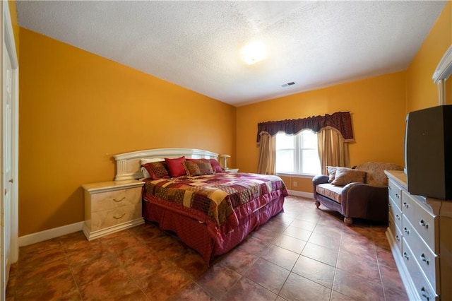 790 Friendship Church Rd, Douglasville, GA 30134 - bedroom featuring a textured ceiling and baseboards
