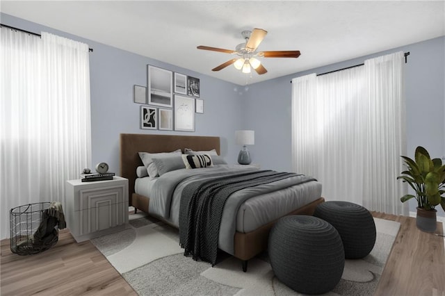 2496 Shiloh Dr, Decatur, GA 30034 - bedroom featuring light wood-style flooring, multiple windows, and a ceiling fan