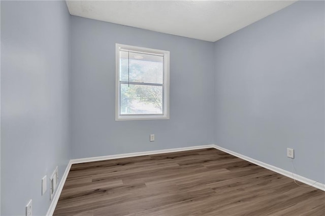 2496 Shiloh Dr, Decatur, GA 30034 - spare room featuring wood finished floors and baseboards