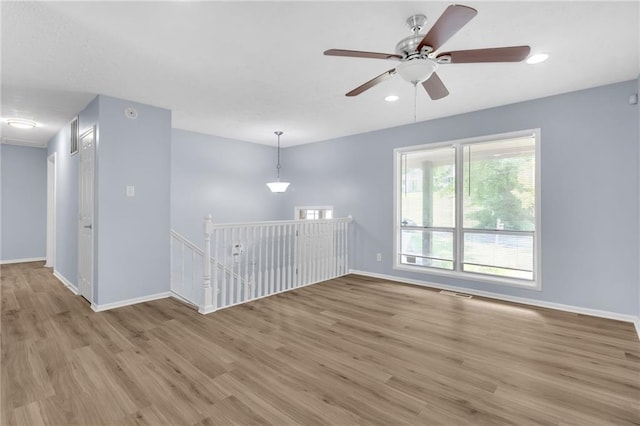 2496 Shiloh Dr, Decatur, GA 30034 - unfurnished room with light wood-style floors, baseboards, ceiling fan, and recessed lighting