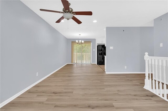 2496 Shiloh Dr, Decatur, GA 30034 - unfurnished room with a chandelier, ceiling fan, light wood-type flooring, baseboards, and recessed lighting