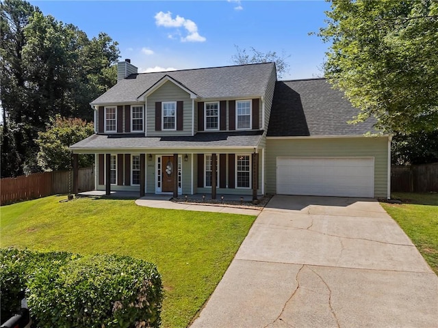 4901 Wilkie Way NW, Acworth, GA 30102 - colonial home featuring a garage, concrete driveway, a chimney, a porch, and roof with shingles