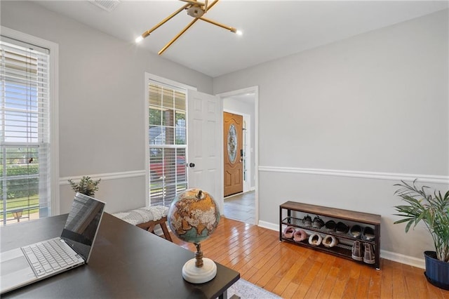 4901 Wilkie Way NW, Acworth, GA 30102 - home office with a chandelier, plenty of natural light, and hardwood / wood-style flooring