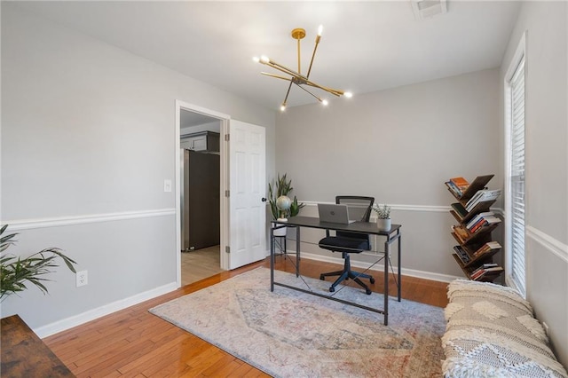 4901 Wilkie Way NW, Acworth, GA 30102 - office area with a chandelier and wood finished floors